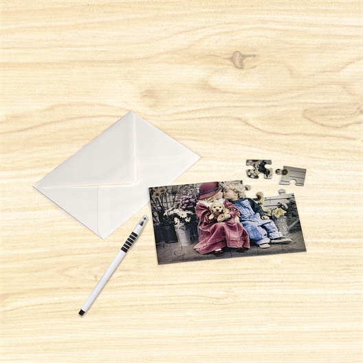 Puzzle carte postale 24 pièces Premier amour