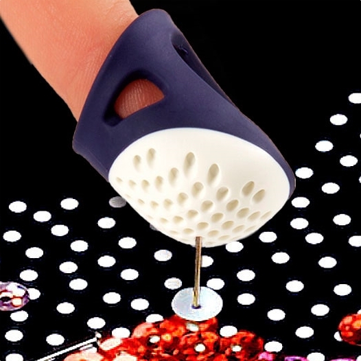 Dé à coudre ergonomique