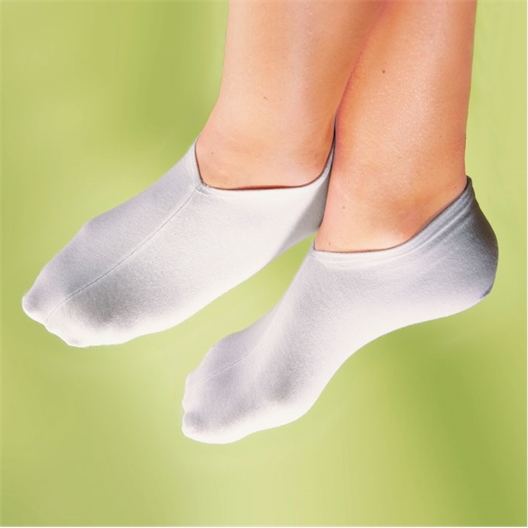 Soin de nuit des pieds : Chaussettes ou crème